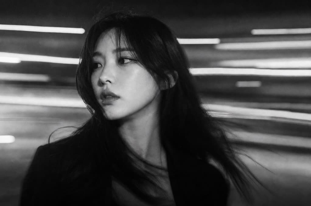 Yoon Dajeong in a blurred black-and-white portrait.